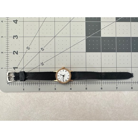 Timex vintage 70s gold bezel white dial manual mechanical black leather watch main image 7